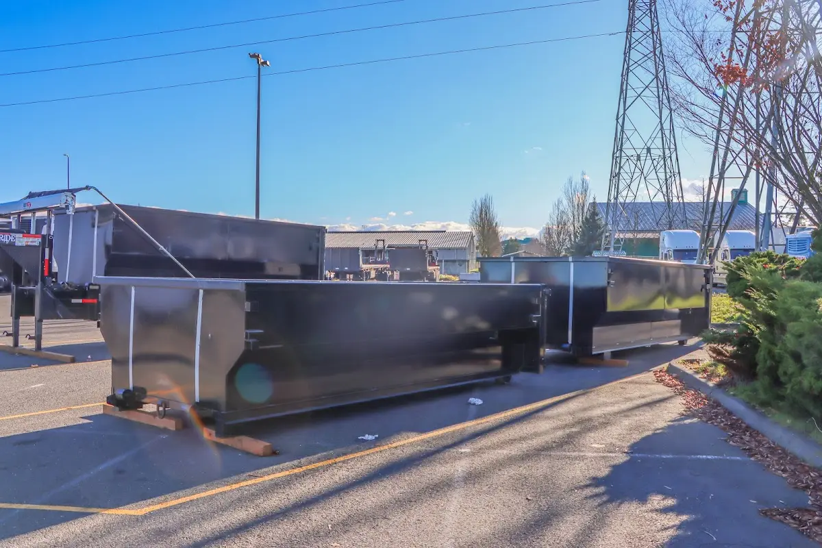 Roll-off dumpster ready for waste disposal at job site for Concrete Dumpster Rental in Killeen